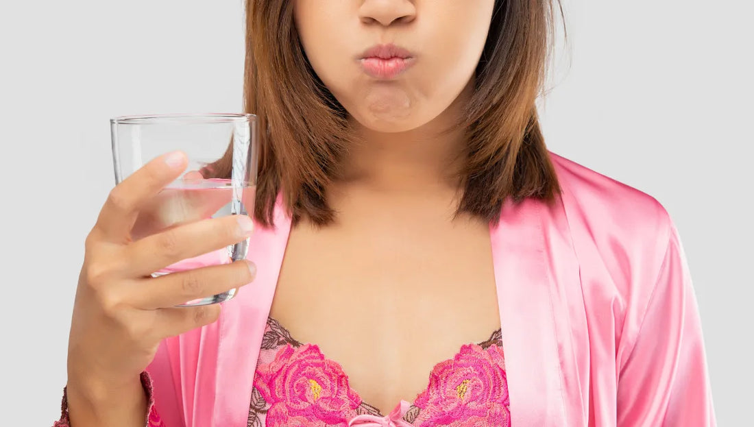 closeup of a woman doing oil pulling for teeth